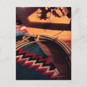Native American blanket , lasso , and spurs Postcard