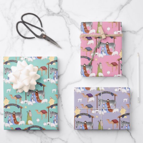Nativity in pink blue and purple wrapping paper sheets