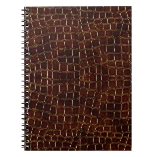 Natural background of lacquered brown crocodile le notebook