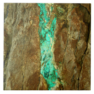 Natural turquoise vein in rough brown stone tile