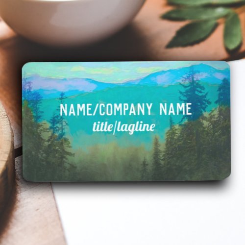 nature art mountains and pines teal and green business card