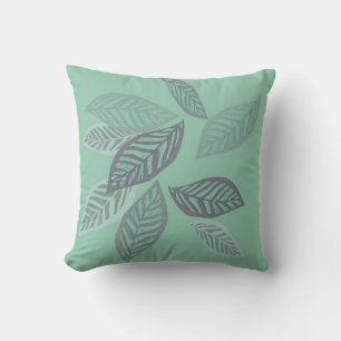 nature art stylized leaves on mint green pillow