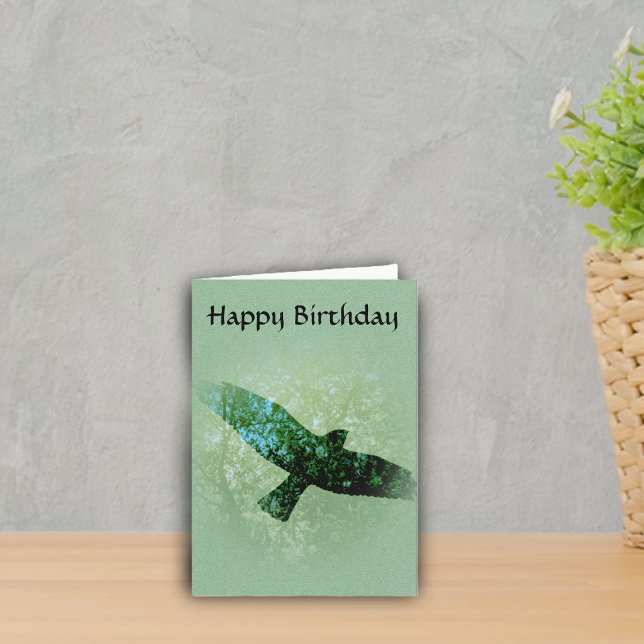 Nature Green Trees Bird Soaring Crow Birthday Card (Transparent black crow flying in tree tops on green Happy Birthday greeting card.)