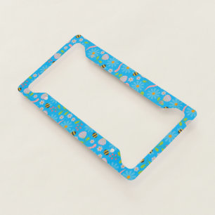 Nature inspired blooms and critters license plate frame