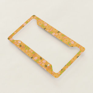 Nature inspired blooms and critters license plate frame