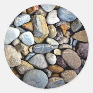 Sticker wet river stones background 