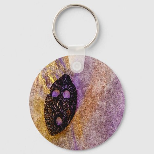 Natures mask on the beach  keychain