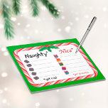 Naughty or Nice Notepad 8.5"x11", 40-pages<br><div class="desc">Santa is taking names. The Naughty get coal.  The Nice get presents. A cute Christmas checklist to help Santa Claus keep track with a candy cane frame,  bright red and green holly and berries. A perfect funny touch for a home or office holiday party!</div>