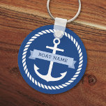 Nautical anchor rope border boat name keys keychain<br><div class="desc">Keychain for your boat keys featuring a white nautical anchor surrounded by a rope border on a dark blue background. Across the anchor is a light blue ribbon with a template field for your boat's name.</div>