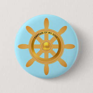Nautical captain golden ship helm on light blue button