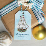Nautical Christmas Watercolor Sailing Ship Gift Tags<br><div class="desc">This nautical Christmas gift tag features a watercolor sailing ship decorated for the holidays, on an aqua blue watercolor texture background, with a personalized name template at the bottom. The back has a coordinating nautical Christmas pattern. Check out the collection for matching products, and feel free to message me through...</div>