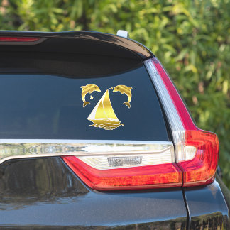 Nautical gold tone dolphin/porpoise + sailboat sticker