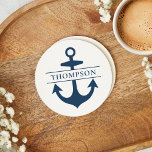 Nautical Navy Blue Anchor Custom Monogram Name Round Paper Coaster<br><div class="desc">Modern and elegant nautical custom family monogrammed paper coaster features a coastal style with boat anchor and intersecting striped monogram text that can be personalized with a last name. Navy blue design can be customized.</div>