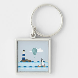 Nautical Scene with Lighthouse and Sailboat Keychain