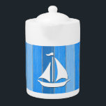 Nautical themed design teapot<br><div class="desc">Nautical themed design with sailing boat decoration on striped blue and gray wooden background. Please note this is not made of wood,  it is a wood graphic print.</div>