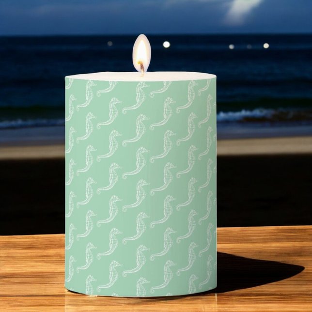 Nautical White Seahorse Skeleton Pattern Green Pillar Candle (3" x 4" candle on table near beach )