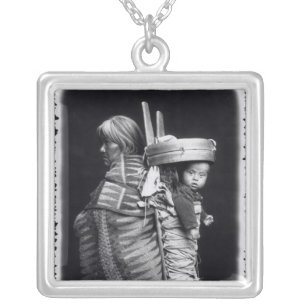 Navaho woman carrying a papoose on her back silver plated necklace