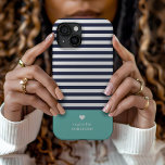 Navy Blue and Aqua Chic Stripes Heart Monogram iPhone 15 Case<br><div class="desc">Stylish custom phone case in aqua, navy blue and white colors. This design features a preppy classic navy and white striped pattern. Personalize it with your name monogram or other custom text with a cute heart symbol. Use the design tools to choose any background colors, edit the text fonts and...</div>