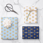 Navy Blue And White Hanukkah Golden David Star Wrapping Paper Sheets<br><div class="desc">Experience the elegance of a stunning golden Star of David pattern,  perfect for celebrating the festive spirit of Hanukkah. This design beautifully contrasts against black,  white,  and navy blue backgrounds,  making your holiday truly special.</div>