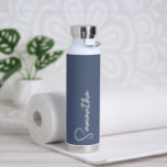 Navy Blue and White Personalized Water Bottle<br><div class="desc">This personalized insulated bottle features your name in white script typography over a navy blue background. Great for keeping those summertime drinks cold or for adding warm feeling for your loved ones over the cold months! Makes a great gift for her! Font styles, and colors can easily be customized by...</div>