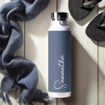 Navy Blue and White Personalized Water Bottle<br><div class="desc">This personalized insulated bottle combines modern style with elegant simplicity, featuring your custom name in white script against a sophisticated navy blue background. Designed to keep drinks cold in summer and warm in winter, this bottle is perfect for the bride, a gift for her, or a stylish companion for yoga,...</div>