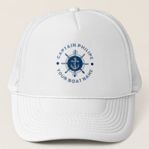 Navy blue and white steering white and boat anchor trucker hat