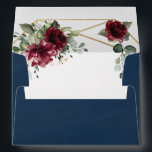 Navy Blue Burgundy Blush Gold Geometric Wedding Envelope<br><div class="desc">Design features a dark navy watercolor wash printed background (outside) with a printed gold colored geometric or terrarium frame covered in elegant eucalyptus and greenery leaves/branches. Beautiful peony and rose floral elements in shades of burgundy, red, Marsala and more with hints of blush pink flowers appear over the greenery. The...</div>