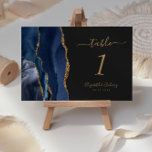 Navy Blue Gold Agate Dark Wedding Table Number<br><div class="desc">The left-hand edge of this elegant modern wedding table number card features a navy blue watercolor agate border trimmed with faux gold glitter. The customizable text combines gold colored handwriting,  italic and copperplate fonts on an off-black background.</div>