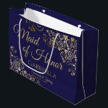 Navy Blue & Gold Lace Maid of Honor Wedding Large Gift Bag<br><div class="desc">This beautiful gift bag is designed as a wedding gift or favor bag for the Maid of Honor. It features a beautiful navy blue background with golden faux foil lace curls and swirls in the corners. The gold script lettering reads "Maid of Honor" with a place to enter her name,...</div>