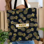 Navy Blue Gold Pineapple Pattern Monogram Tote Bag<br><div class="desc">Navy Blue Gold Pineapple Pattern Monogram Tote Bag. Beautiful elegant navy blue and gold tropical pineapple pattern design. Personalize this custom design with your name.</div>