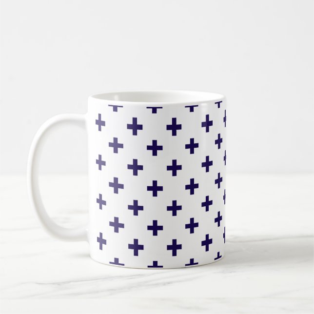 Navy blue polka crosses on white coffee mug (Left)