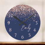 Navy Blue Rose Gold Blush Pink Glitter Monogram Round Clock<br><div class="desc">Navy Blue and Rose Gold Blush Pink Sparkle Glitter Brushed Script Monogram Name Clock. This makes the perfect sweet 16 birthday,  wedding,  bridal shower,  anniversary,  baby shower or bachelorette party gift for someone that loves glam luxury and chic styles.</div>