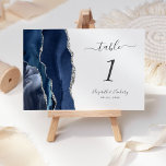 Navy Blue Silver Agate Wedding Table Number<br><div class="desc">The left-hand edge of this elegant modern wedding table number card features a navy blue watercolor agate border trimmed with faux silver glitter. The customizable text combines charcoal gray handwriting,  and italic and copperplate fonts on a white background.</div>