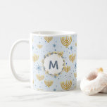 Navy Blue Watercolor Monogram   Hanukkah Pattern Coffee Mug<br><div class="desc">This Festival of Lights / Hanukkah design features a navy blue watercolor monogram in a circle bordered by a wreath with matching navy blue and gold flowers. The background pattern of menorah and Star of David is set on pastel blue. The background may be changed to any color by choosing...</div>