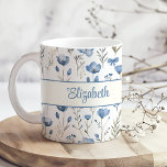 Navy Blue Watercolor Wildflowers Poppy Script Name Coffee Mug<br><div class="desc">Start your day with a touch of elegance using the "Navy Blue Watercolor Wildflowers Poppy Script Name Coffee Mug." This beautiful mug features a delicate watercolor design of navy blue wildflowers, with a striking poppy accent, creating a serene and calming aesthetic. The design is complemented by a personalized script name,...</div>