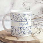 Navy Blue Watercolor Wildflowers Script Name Coffee Mug<br><div class="desc">Sip your favorite beverage in style with the "Navy Blue Watercolor Wildflowers Script Name Coffee Mug." This beautifully crafted mug features an elegant watercolor design of delicate navy blue wildflowers, bringing a touch of nature's serenity to your morning routine. The soft, flowing floral pattern is complemented by a personalized script...</div>
