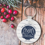 Navy Blue & White Rustic Wood Nautical Lake House Keychain<br><div class="desc">Keep your keys stylishly organized with our Navy Blue & White Rustic Wood Nautical Lake House Keychain! Featuring a charming lake house logo in elegant navy blue hues, complete with pine trees, canoe paddles, a serene water pond, anchors, and a cozy house illustration on a white rustic wood background, this...</div>