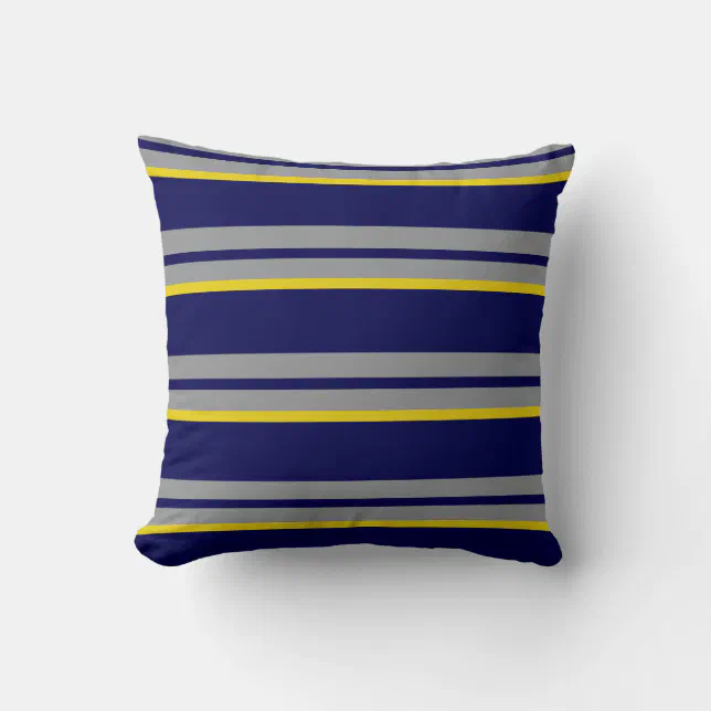 grey yellow navy blue pillows        
        <figure class=