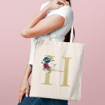 Navy Burgundy Watercolor Floral Monogram Tote Bag<br><div class="desc">Rich navy and burgundy watercolor blooms cascade around a large monogram initial on this elegant tote. A personalized name beneath completes the sophisticated design. A stunning bridal party keepsake that transitions beautifully to everyday use for shopping,  travel,  and more. Initial and name are fully customizable.</div>