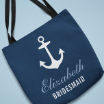 Navy Nautical Anchor Custom Wedding Bridesmaid Tote Bag<br><div class="desc">Custom wedding tote bag features a boat anchor with custom text that can be personalized with the name and role of the person in your bridal party. A pattern of red,  cloud blue,  gray,  and white anchors appears on the back side. The navy blue background color can be customized.</div>