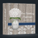 Navy White Hydrangea Mason Jar Wedding Planner 3 Ring Binder<br><div class="desc">Pretty rustic style monogrammed mason jar binder with a white hydrangea flower and a wooden fence and antique damask pattern lace background and stitched navy blue hued ribbon. This wedding organizer can be personalized with the initials and monogram of the bride and groom on the mason jar and customized with...</div>