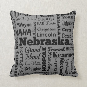 Nebraska cities typography pillow in gray (II)