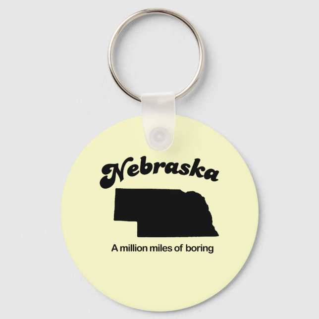Nebraska Motto - A million miles of boring Keychain (Front)