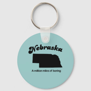 Nebraska Motto - A million miles of boring Keychain