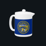 Nebraska State Flag Teapot<br><div class="desc">Enhance your tea time with a touch of Nebraska pride using our exclusive teapot featuring the flag of Nebraska! This teapot is more than just a functional kitchen item; it’s a celebration of Nebraska’s heritage and a unique way to showcase your state pride. Each teapot prominently displays a vibrant print...</div>