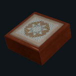 Needlepoint large gift box<br><div class="desc">An eight point star in subtle browns and blues. The original handmade by Laura Case.</div>