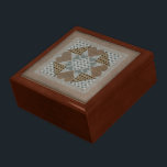 Needlepoint large gift box<br><div class="desc">An eight point star in subtle browns and blues. The original handmade by Laura Case.</div>