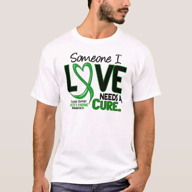 Needs A Cure 2 Tourette's Syndrome T-Shirt (Front)