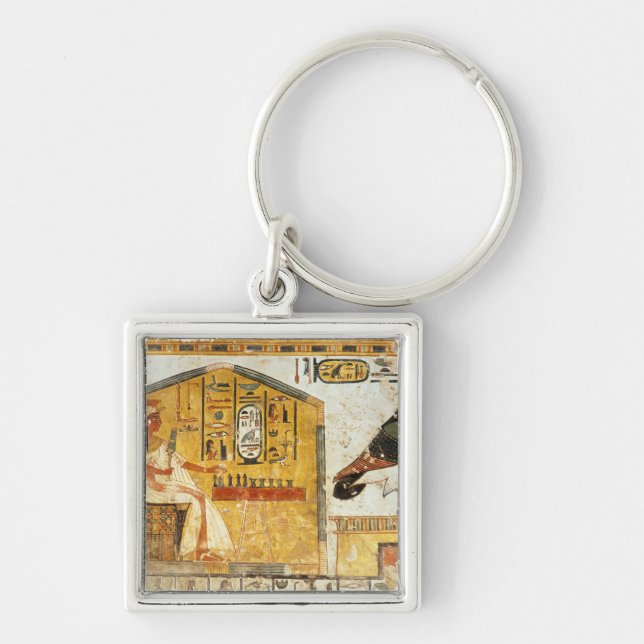 Nefertari playing senet keychain (Front)