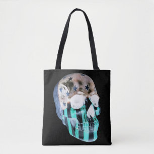 Negative image painted skull on black tote bag